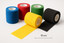 10cm cohesive bandages in multiple colors (blue, red, green, yellow, and black) arranged on a white background, showing both rolled and partially unrolled bandages with a subtle measurement indicator showing the 10cm width